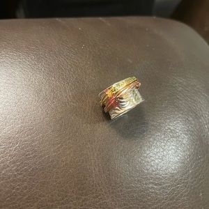 This is an spinner ring, silver w/gold spinner,NEW, attractive